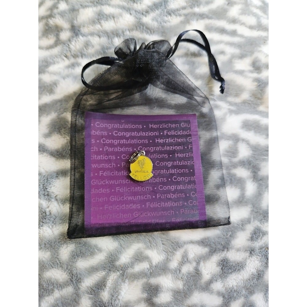 New Younique Yellow Presenter Status Charm with Black Organza Bag
